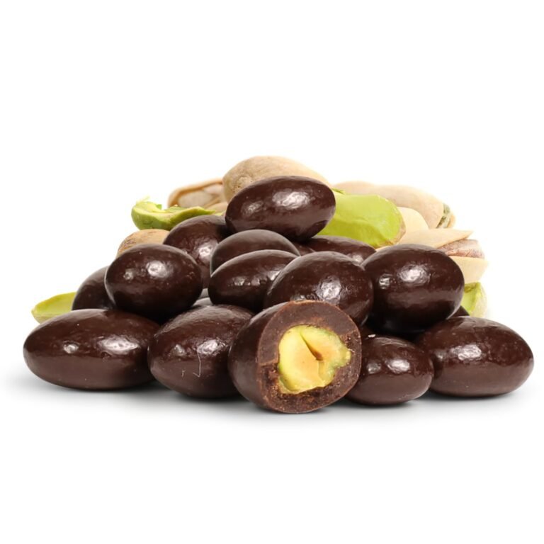 Dark chocolate-covered pistachios in a pile